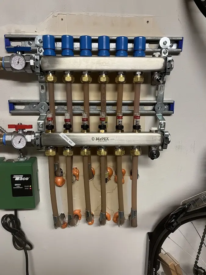 Plumber performing Gas Line Installation at a residential property in Fairview